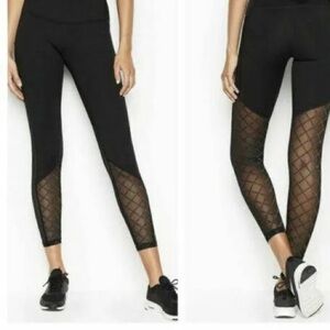 Victoria’s Secret black leggings with sheer and gold accents